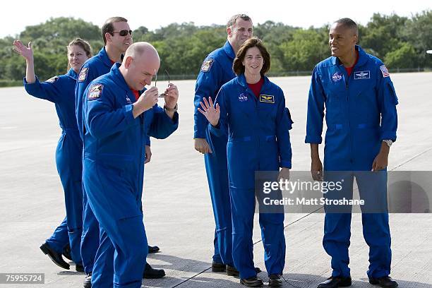 Space Shuttle Endeavour astronauts, mission specialists Alvin Drew Jr., former teacher Barbara R. Morgan, Canadian Space Agency's Dave Williams,...