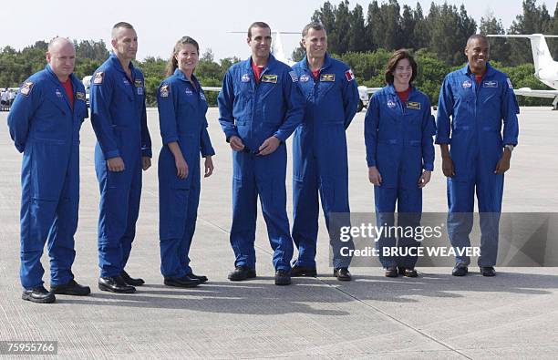 The crew of the US space shuttle Endeavour pose for a photo 03 August 2007 at Kennedy Space Center's Shuttle Landing Facility in preparation for...