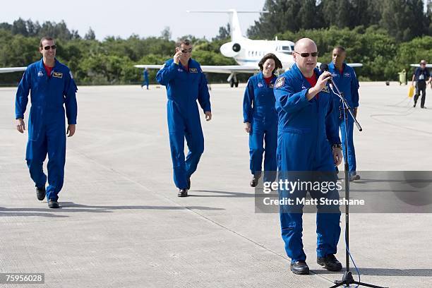 Space Shuttle Endeavour Commander Scott J. Kelly addresses the media as mission specialists Alvin Drew Jr., former teacher Barbara R. Morgan,...