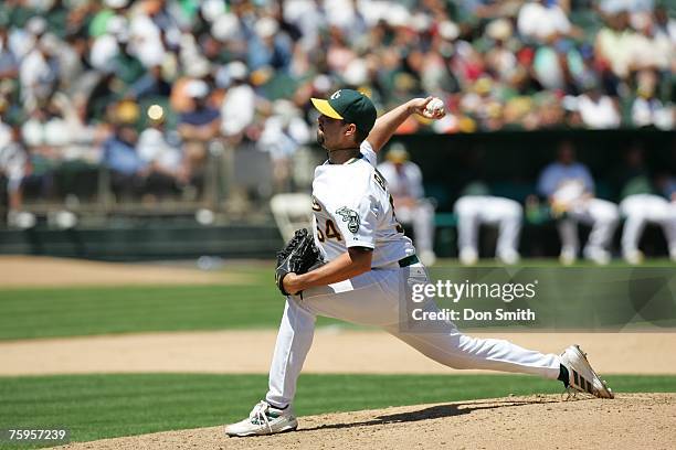 Andrew Brown of the Oakland Athletics pitches during the game against the Detroit Tigers at the McAfee Coliseum in Oakland, California on August 1,...