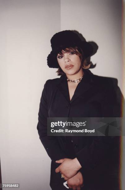 Singer Faith Evans poses for photos in between takes of filming the tribute video for the Notorious B.I.G., ‘I’ll Be Missing You’ at Essanay Studios...
