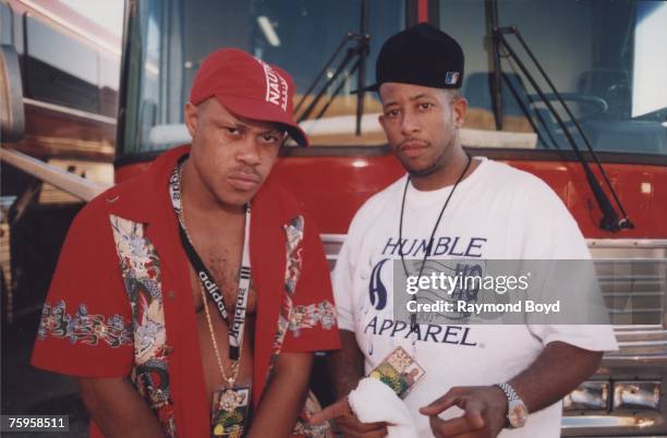 Rapper Guru and DJ Premier of Gang Starr poses for photos at their tour bus outside the International Amphitheatre prior to their performance in...
