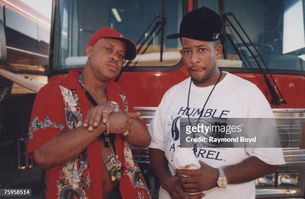 Rapper Guru and DJ Premier of Gang Starr poses for photos at their tour bus outside the International Amphitheatre prior to their performance in...