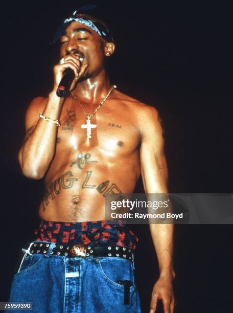 Rapper Tupac Shakur performs onstage in 1994 in Chicago, Illinois.