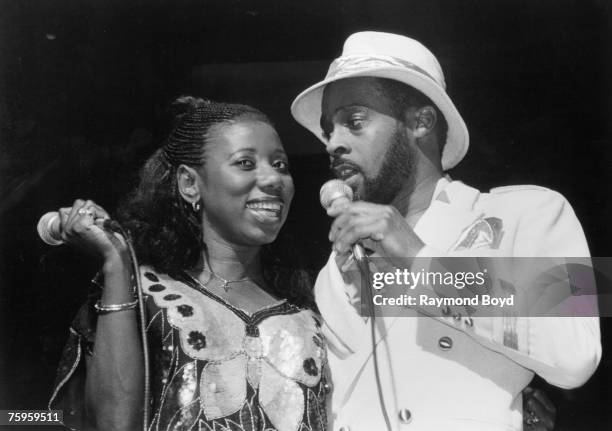 Singers and musician Mary Davis and Abdul Ra'oof of The S.O.S. Band performs at the Auditorium Theatre in Chicago, Illinois in January 1985.