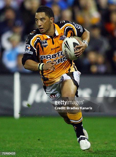 Benji Marshall of the Tigers in action during the round 21 NRL match between the Gold Coast Titans and the West Tigers at Carrara Stadium on August...