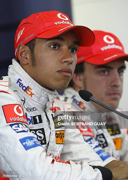 British McLaren-Mercedes driver Lewis Hamilton and team mate Spanish Fernando Alonso attend a press conference at the Hungaroring racetrack, 04...