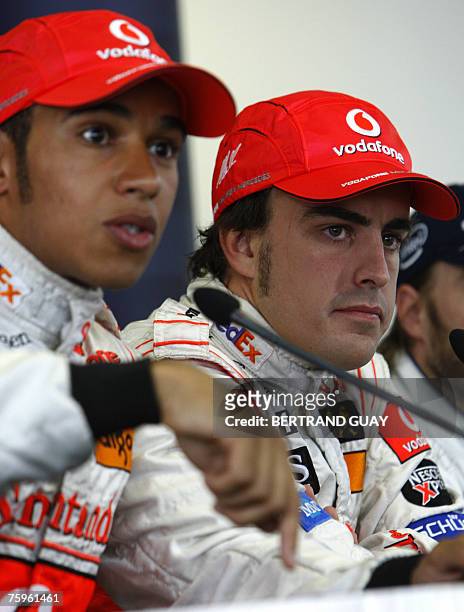 British McLaren-Mercedes driver Lewis Hamilton and team mate Spanish Fernando Alonso attend a press conference at the Hungaroring racetrack, 04...