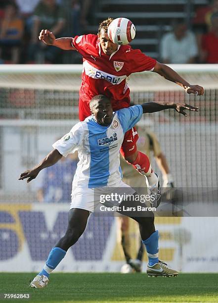 Valentine Atem of Wehen fights Gledson of Stuttgart during the German Football Association Cup first round match between SV Wehen-Wiesbaden and VfB...