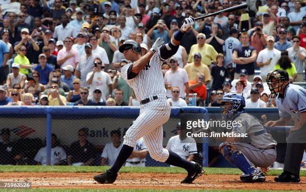 Alex Rodriguez of the New York Yankees sends the ball into the left field seats for his 500th career home run in the first inning against Kyle Davies...