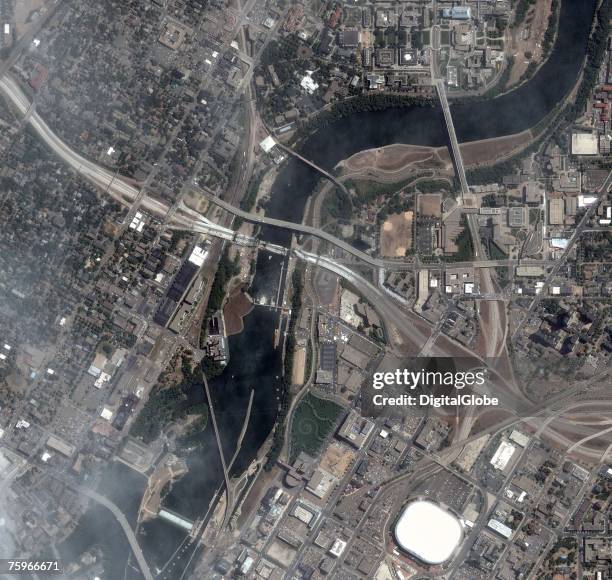 This is a satellite image of downtown Minneapolis, Minnesota and shows the I-35 bridge after it collapsed on August 1, 2007.