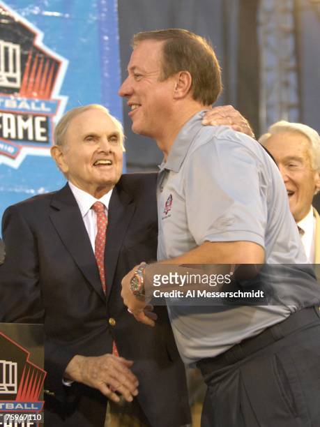 Buffalo Bills owner Ralph Wilson and retired quarterback Jim Kelly hug during the Class of 2007 Pro Football Hall of Fame Enshrinement Ceremony...