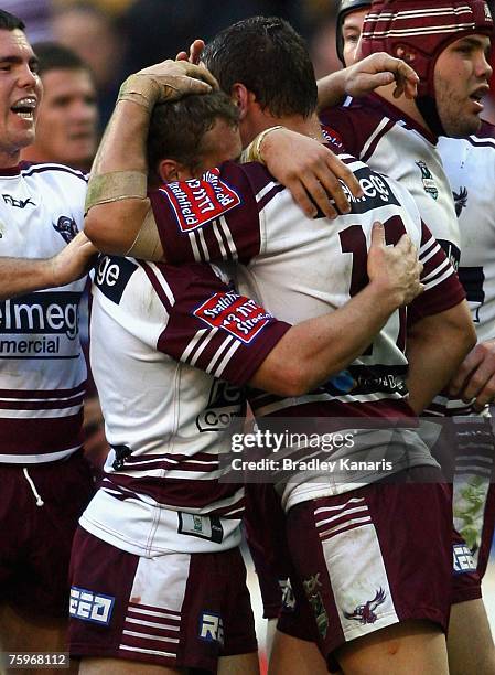 Matt Orford and Anthony Watmough of the Sea Eagles celebrate a try during the round 21 NRL match between the Brisbane Broncos and the Manly Warringah...