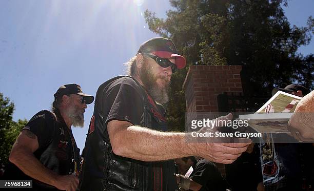 Vietnam veterans enter the San Jose Rose Garden for the public memorial for Pat Tillman May 3, 2004.