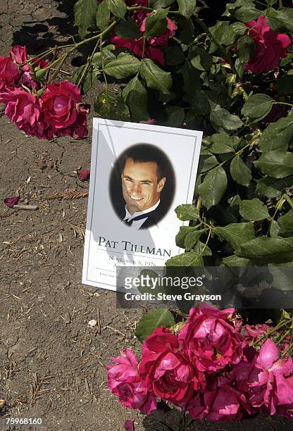 Program of the memorial services for Pat Tillman is shown among roses at the San Jose Rose Garden May 3, 2004.