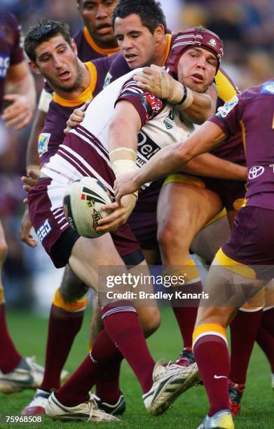 Adam Cuthbertson of the Sea Eagles gets a pass away during the round 21 NRL match between the Brisbane Broncos and the Manly Warringah Sea Eagles at...