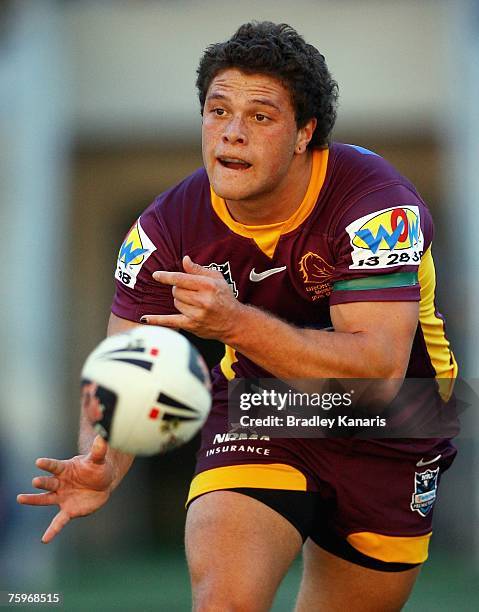 John Te Reo of the Broncos passes the ball during the round 21 NRL match between the Brisbane Broncos and the Manly Warringah Sea Eagles at Suncorp...