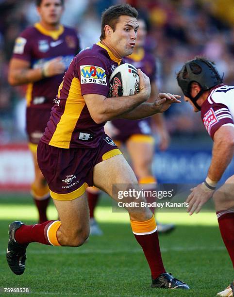 Dane Carlaw of the Broncos takes on the Sea Eagles defence during the round 21 NRL match between the Brisbane Broncos and the Manly Warringah Sea...