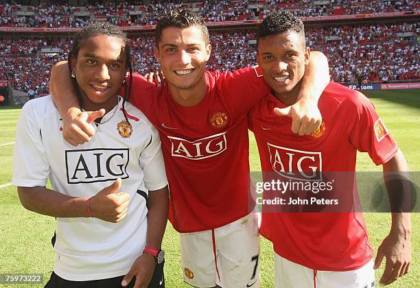 Anderson, Cristiano Ronaldo and Nani of Manchester United celebrate after winning the Community Shield pre-season friendly match between Chelsea and...
