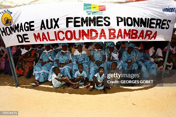 Women who demanded an end to excision in 1997 are seated 05 August 2007 under a tent in the main square of Malicounda Bambara where representatives...