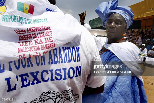 Maimouna Traore, the 1997 pioneer in fighting excision in young girls arrives at the main square of Malicounda Bambara, where young girls...