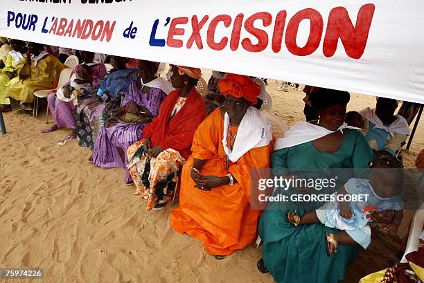 Women are seated 05 August 2007 under a tent in the main square of Malicounda Bambara where representatives of some 2700 villages in Senegal and...