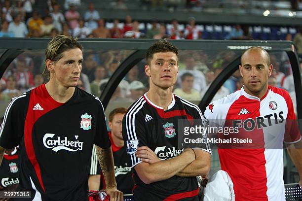 Fernando Torres Xabi Alonso and Pepe Reina of Liverpool after the Port of Rotterdam Tournament match between Feyenoord and Liverpool at the De Kuip...