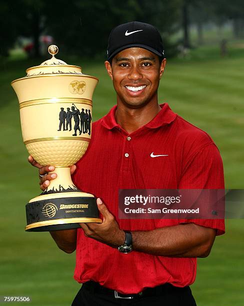 Tiger Woods holds the trophy after winning the WGC-Bridgestone Invitational at Firestone Country Club August 5, 2007 in Akron, Ohio.