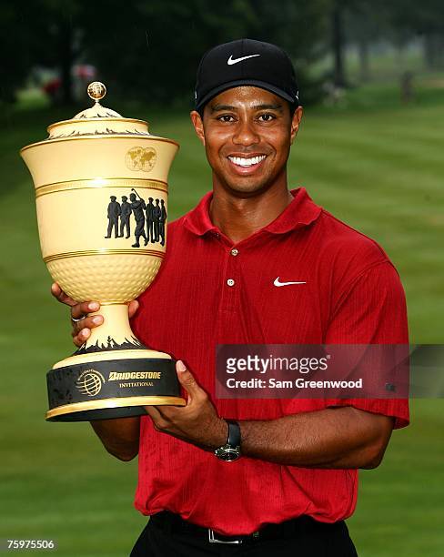 Tiger Woods holds the trophy after winning the WGC-Bridgestone Invitational at Firestone Country Club August 5, 2007 in Akron, Ohio.