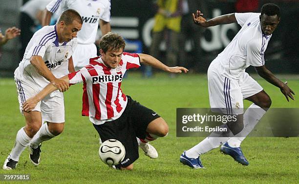 Real's Cannavaro Fabio and Diarra Mamadu competes for the ball with Lazovic Danko of FC PSV Eindhoven during the Railways Cup final between Real...