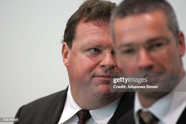 Max Strauss , son of former Bavarian state Governor Franz Josef Strauss, and his lawyer Bernd Muessigg await the last day of his re- trial at...