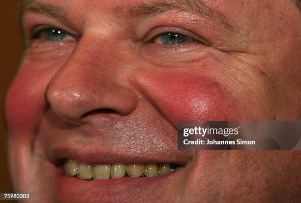 Max Strauss, son of former Bavarian state Governor Franz Josef Strauss , laughs after his release at the last day of his re- trial at Augsburg's...