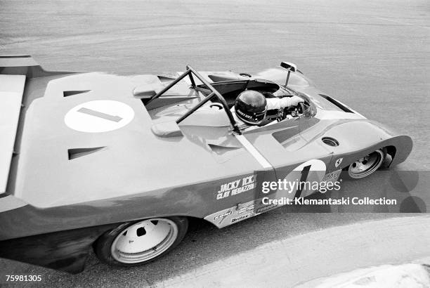 Ferrari driver Jacky Ickx wheeling his 312PB through La Souce during the 1000km of Spa Francorchamps, 7th May 1972. He shared the car with Clay...