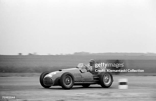 Froilan Gonzalez hustles his 4.5-liter Ferrari 375/F1 car through Abbey Curve during the British Grand Prix at Silverstone, 14th July 1951.