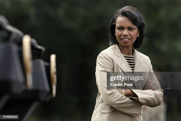 Secretary of State Condoleezza Rice awaits the start of a joint press conference between U.S. President George W. Bush and Afghan President Hamid...