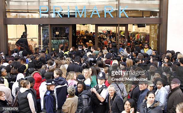 Police are called due to unexpected large crowds at the opening of Primark Oxford Street, April 5 in central London.