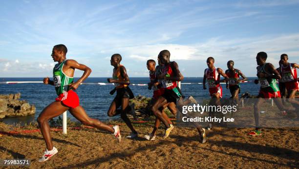Kenenisa Bekele of Ethiopia leads the men's 12,000-meter race with the Indian Ocean as a backtrop during the 12,000-meter race in the 35th IAAF World...
