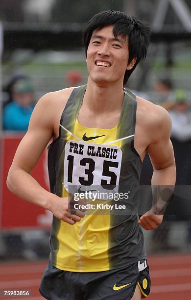 Liu Xiang of China takes a victory lap after winning the 110-meter hurdles in 13.23 in the Prefontaine Classic at the University of Oregon's Hayward...