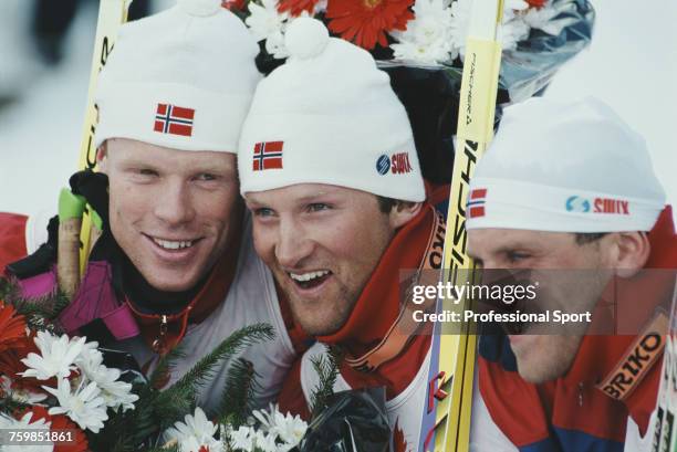 View of the all Norwegian medal winners in the Men's 30 km classical cross-country skiing event with, from left, silver medallist Bjorn Daehlie, gold...