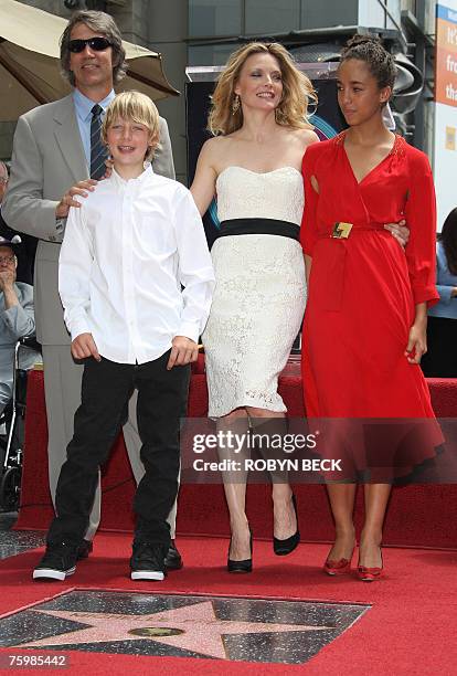 Actress Michelle Pfeiffer poses with her daughter Claudia , her son John and her husband David E. Kelley after Pfeiffer's star was unveiled on the...