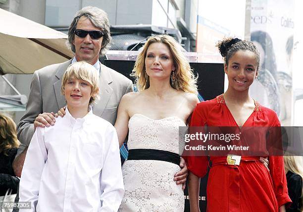 Actress Michelle Pfeiffer, her husband, producer David E. Kelley, her son John and daughter Claudia attend a ceremony honoring Pfeiffer with a Star...