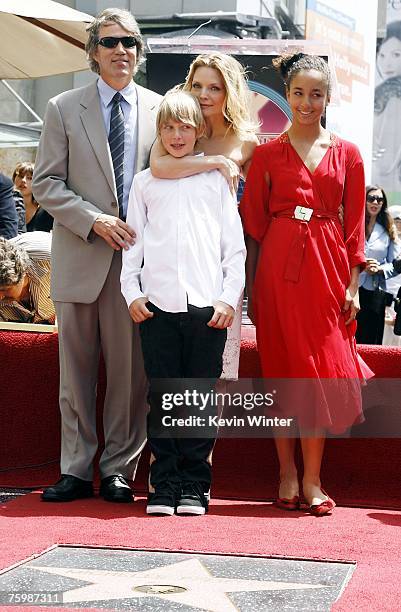 Actress Michelle Pfeiffer, her husband, producer David E. Kelley, her son John and daughter Claudia attend a ceremony honoring Pfeiffer with a Star...