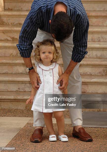 Prince Felipe and her daughter Leonor pose for Photographers at Marivent Palace on August 6, 2007 in Mallorca,Spain