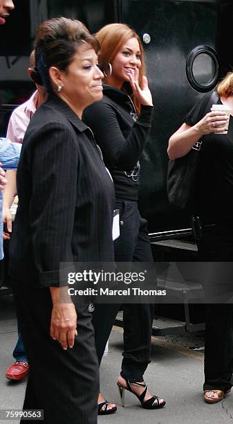 Singer Beyonce Knowles sighting,walking on 5th Avenue to the set of her American Express commercial wearing a House of Dereon shirt on August 6 2007...