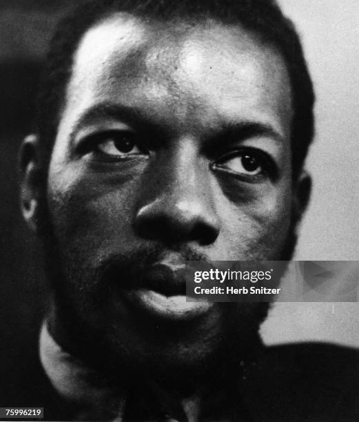 Jazz saxophonist Ornette Coleman poses for a portrait in 1960.