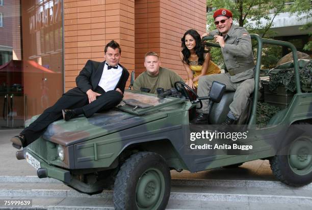 Cast members attend the "Ausbilder Schmidt" - The Movie: Photocall on August 7, 2007 in Berlin, Germany.