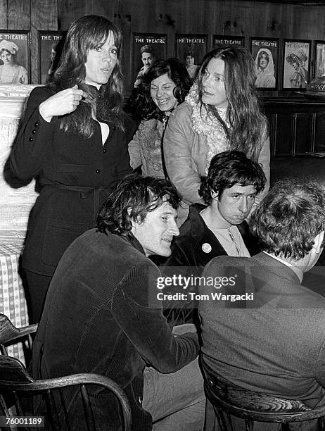 Jane Fonda and husband Tom Hayden with Judy Collins attend a political rally at Gallaghers Restaurant in the 1970's in New York City.