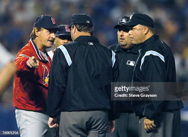 Tony LaRussa of the St. Louis Cardinals disputes a call with the umpiring crew in game four of the National League Division Series at Dodger Staduim....