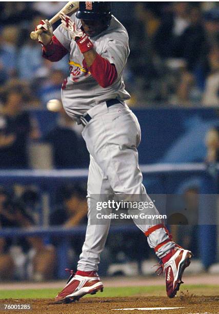 Edgar Renteria of the St. Louis Cardinals is hit by a pitch in game four of the National League Division Series on October 11, 2004 at Dodger...