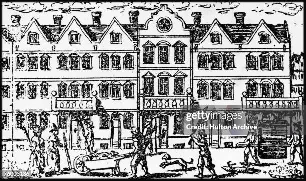 Street scene during the Great Plague of London, which killed 20 per cent of the city's population between 1665 and 1666. Crosses mark the doors of...